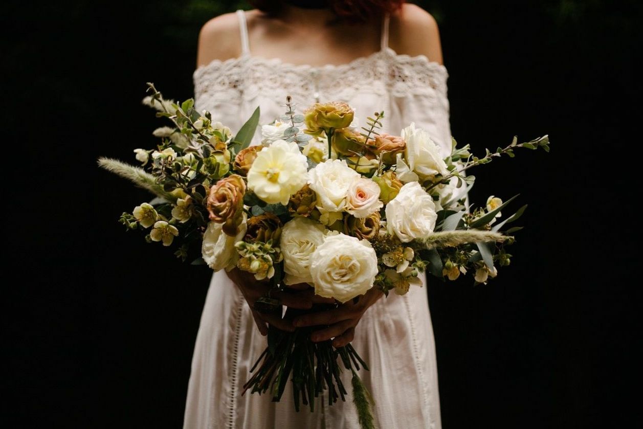 Wedding table with bud vases and candle clusters